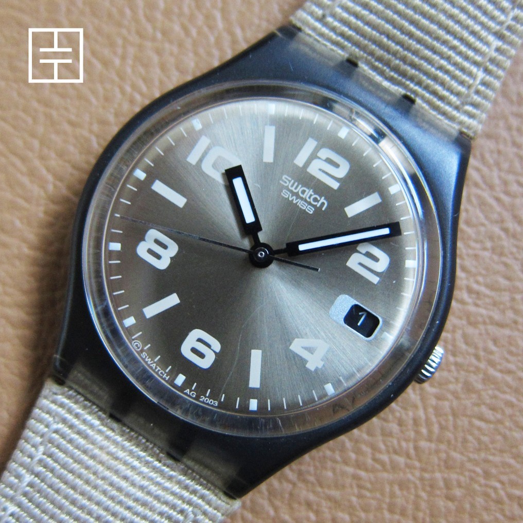SWATCH Unisex Quartz Watch w/ Metallic Beige Dial (SWISS MADE)