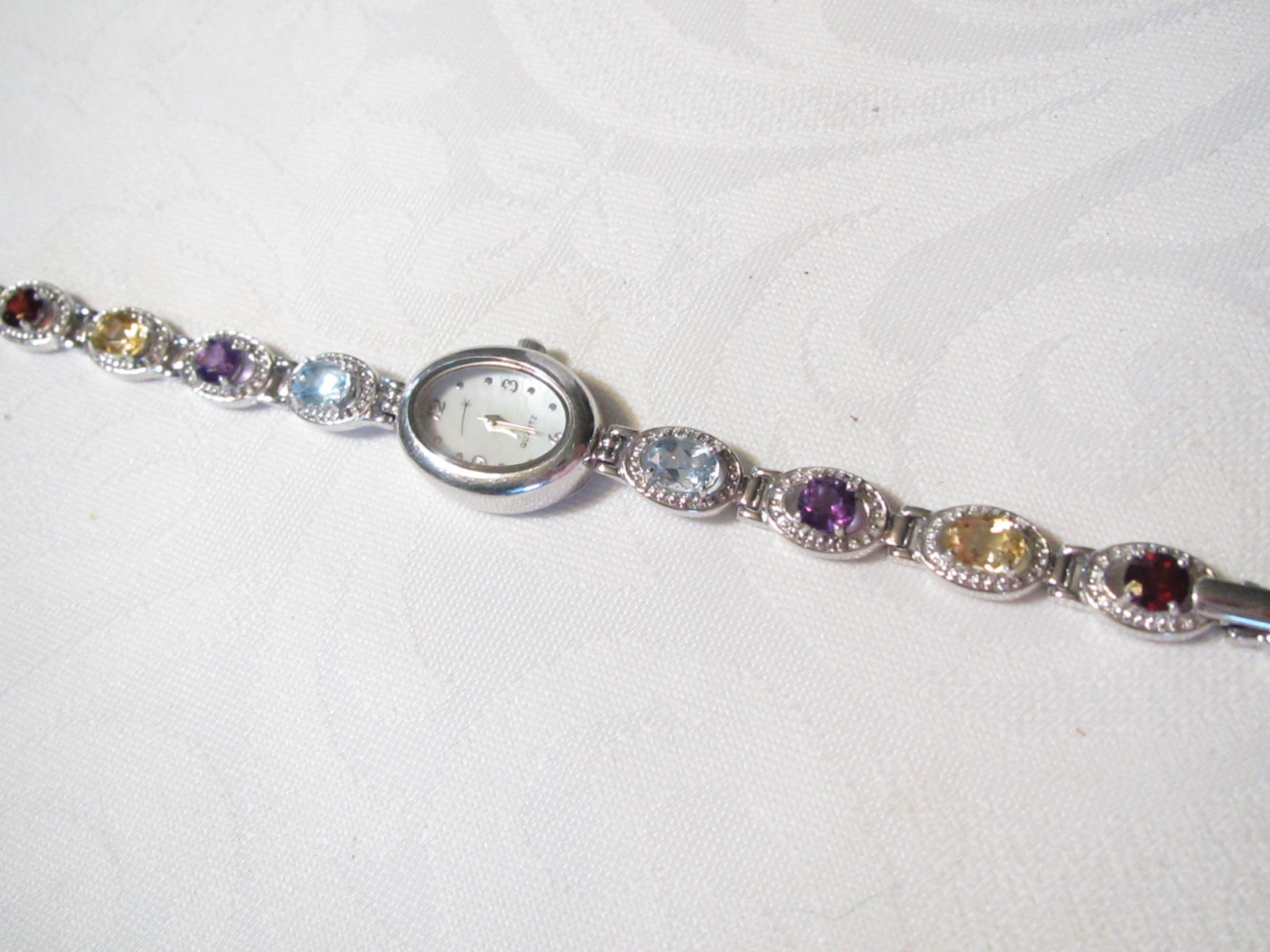 BEAUTIFUL STERLING SILVER MULTI GENUINE GEMSTONES 7 1/4″ QUARTZ WATCH – 29.6 GR.