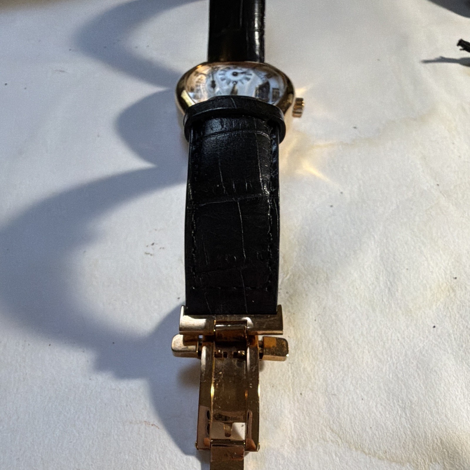 Stührling Original Automatic Tonneau Gold Tone Moon Phase Black Leather Strap