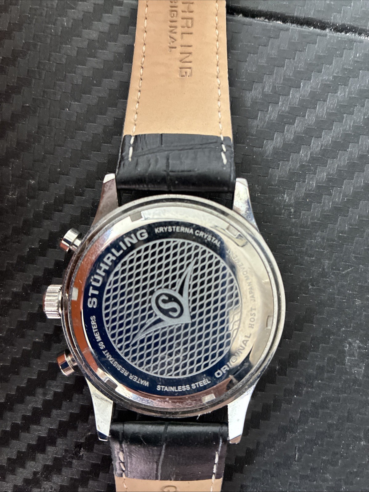 stuhrling original , water resistant, 2 years manufacturer Warranty