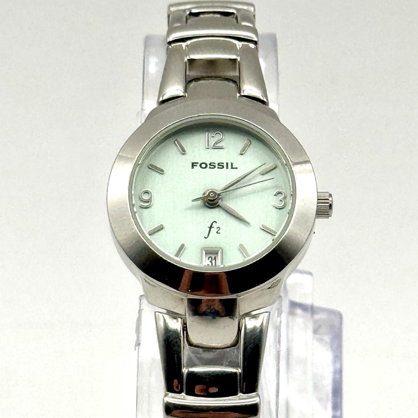 Fossil F2 Ladies Watch 23mm Silver Tone Date Blue Green Dial New Battery 7″