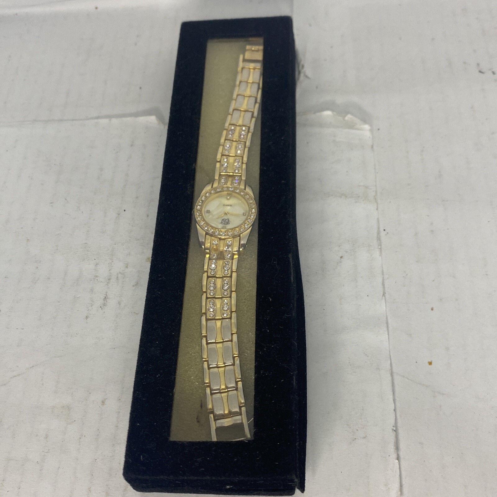 ELIZABETH TAYLOR WOMEN’S ET GOLD TONE RHINESTONE ACCENT MOP DIAL WRIST WATCH