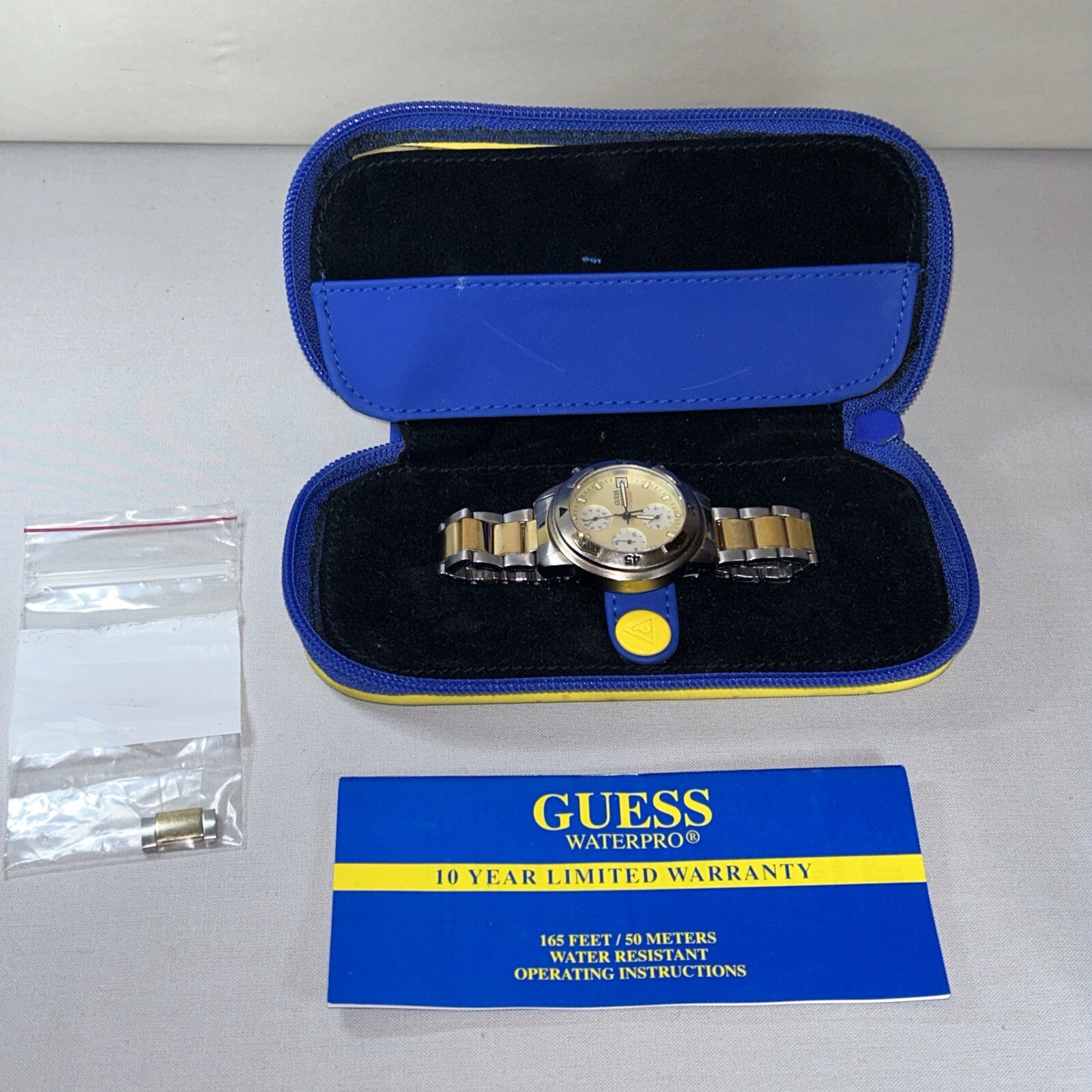 GUESS WATERPRO 165 feet / 50 meters Silver and Gold Tone Mens Watch With Case