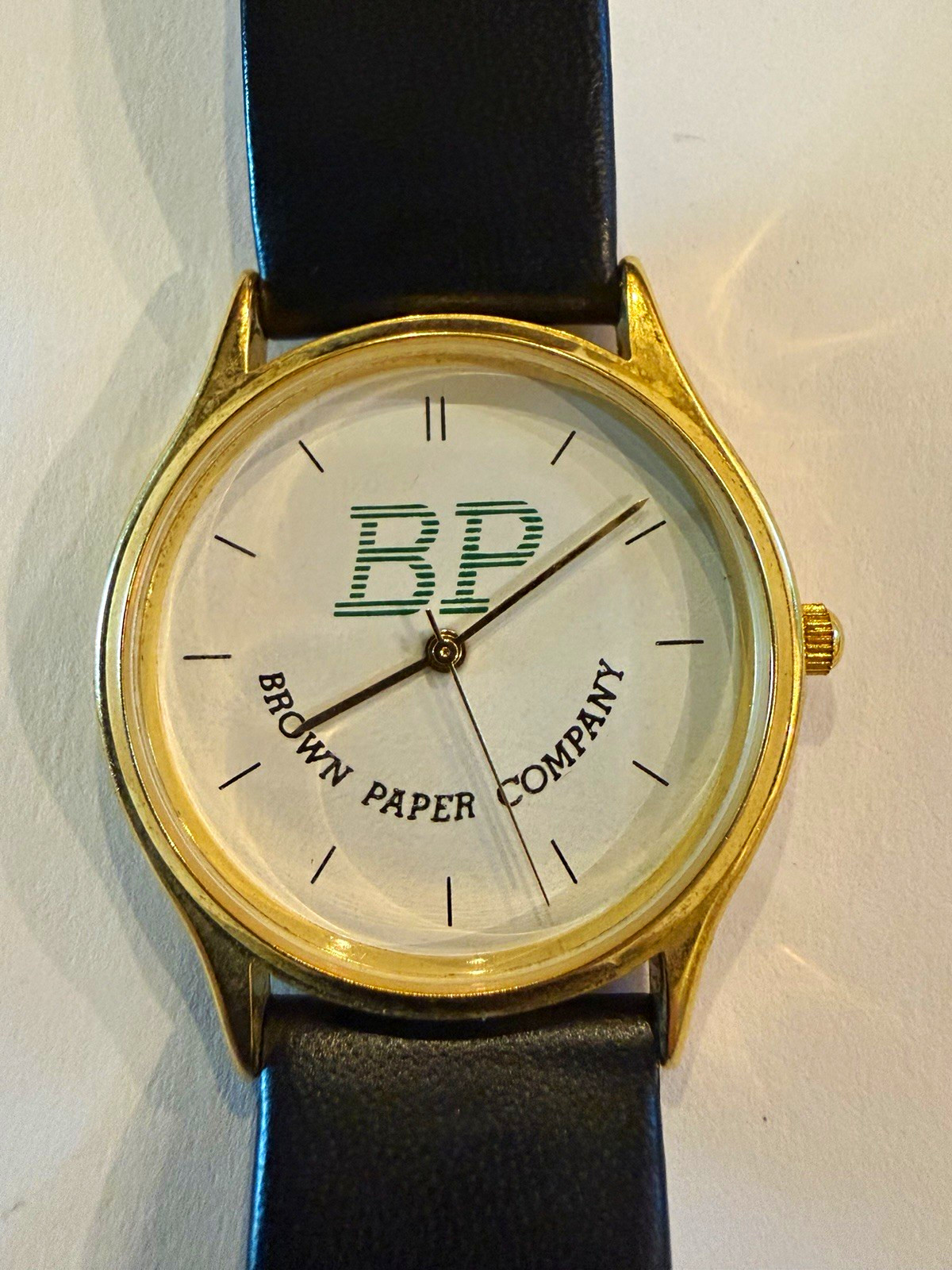 Brown Paper Company Logo Dial Analog Quartz Gold Case Black Leather Strap