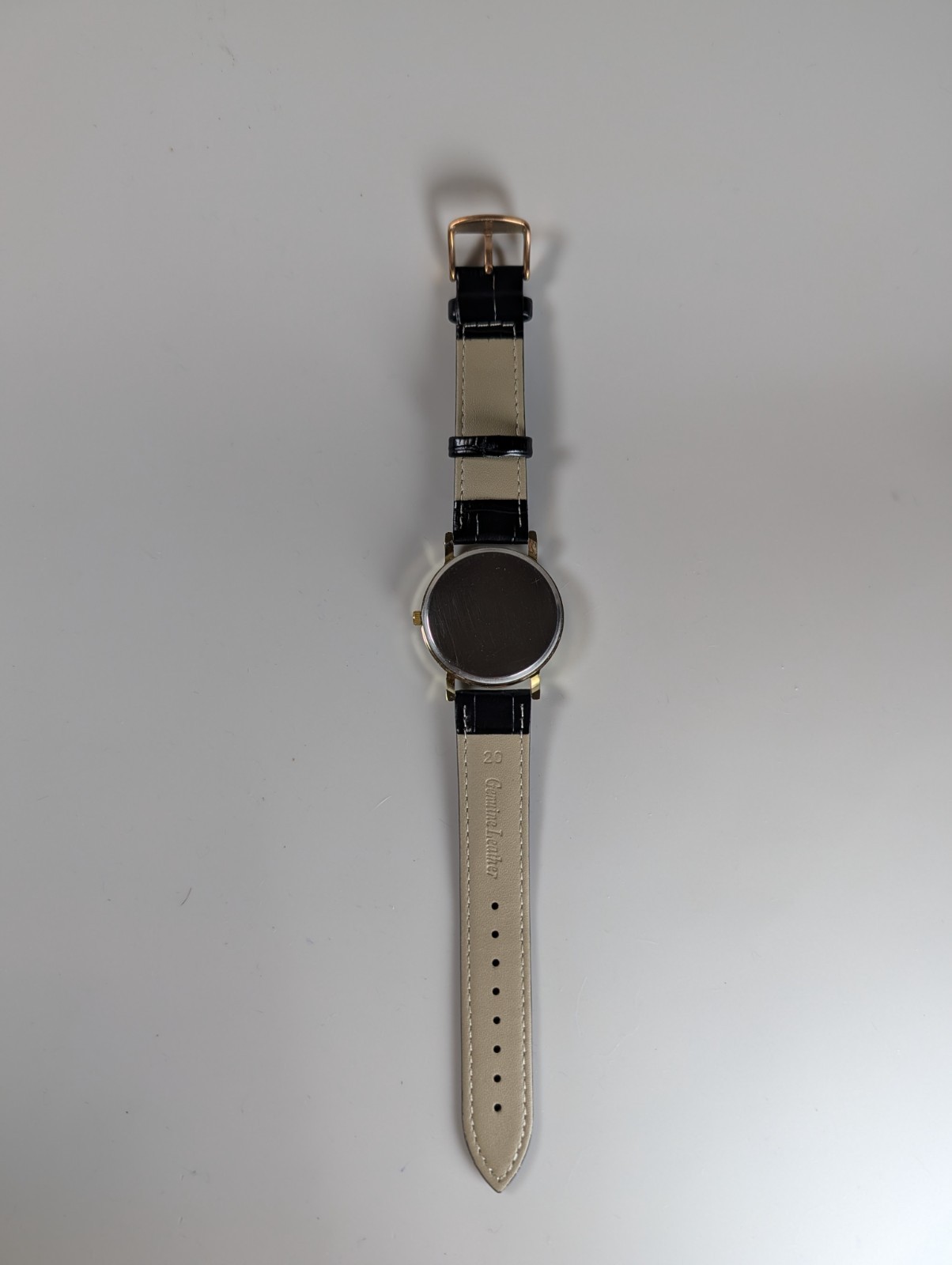 Elephant watch with flower pattern and dot indexes black leather band