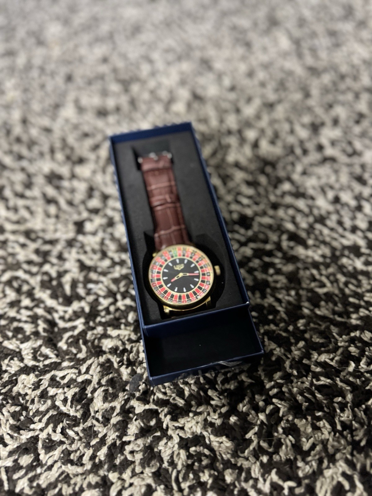 Analog Wristwatch Black Dial Multicolor/Gold Bezel Gold Case Brown Leather Box