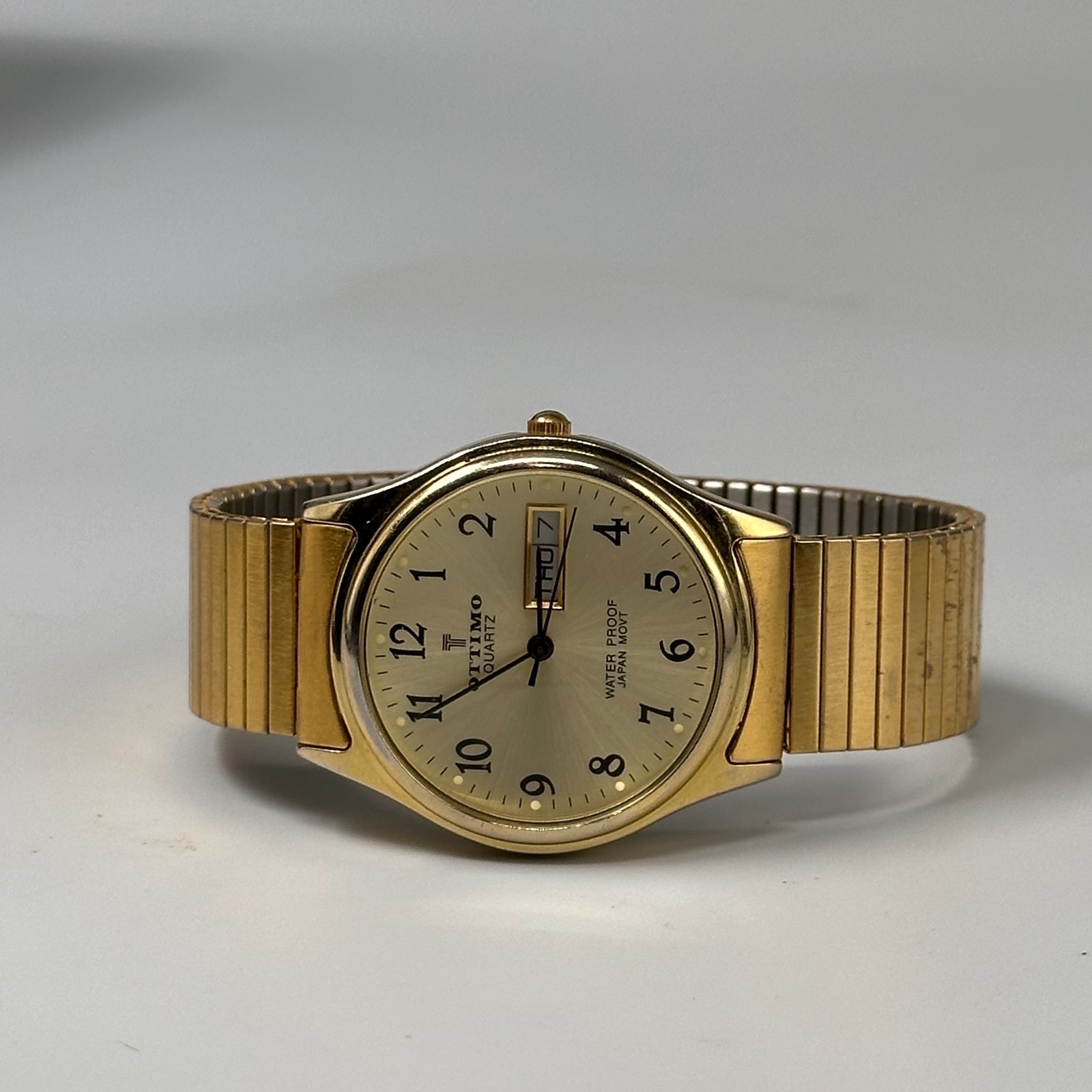 Ottimo Watch Men Gold Tone Date Window Stretch Expansion Band New Battery 7.25″
