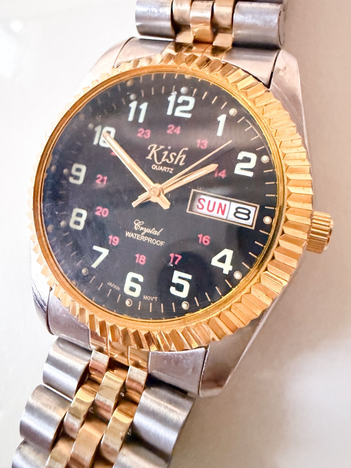 Super Clean Men’s Kish watch black face, gold bezel, two tone band – Rare Find!