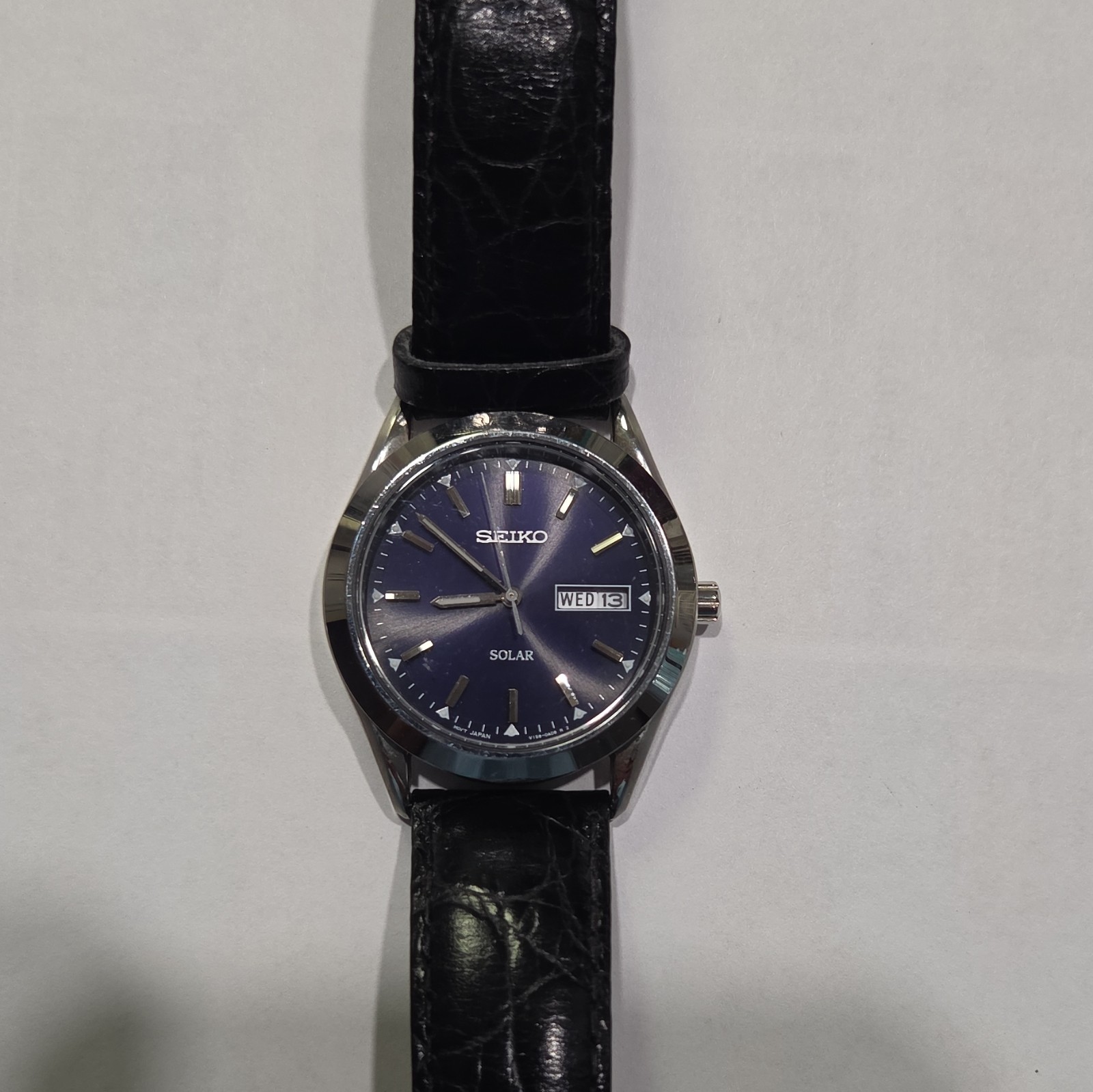 Seiko Solar Men’s Quartz Analog Watch Blue Dial Day/Date Black Leather Strap
