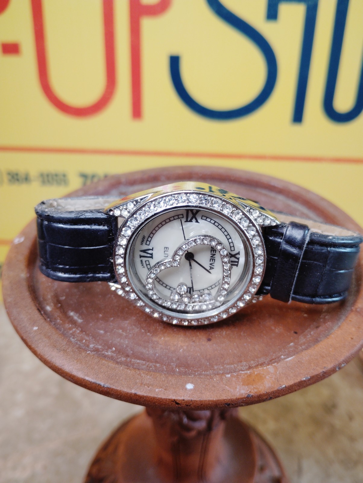 Geneva Quartz Women’s Watch with Rhinestone Bezel and Leather Band