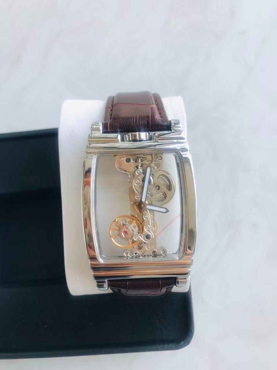 Men’s Silver Bridge Transparent Mechanical Skeleton watch Brown butterfly buckle