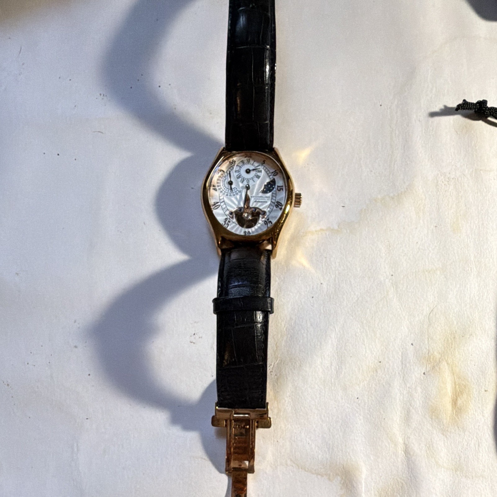 Stührling Original Automatic Tonneau Gold Tone Moon Phase Black Leather Strap