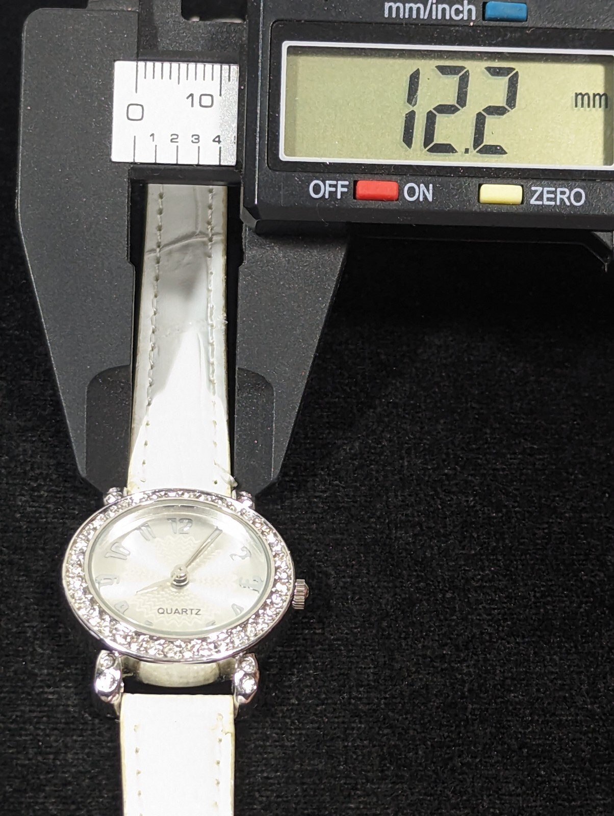 Silver Tone Dial Crystal Accent Round Case White Faux Leather Band Watch 7.5 In