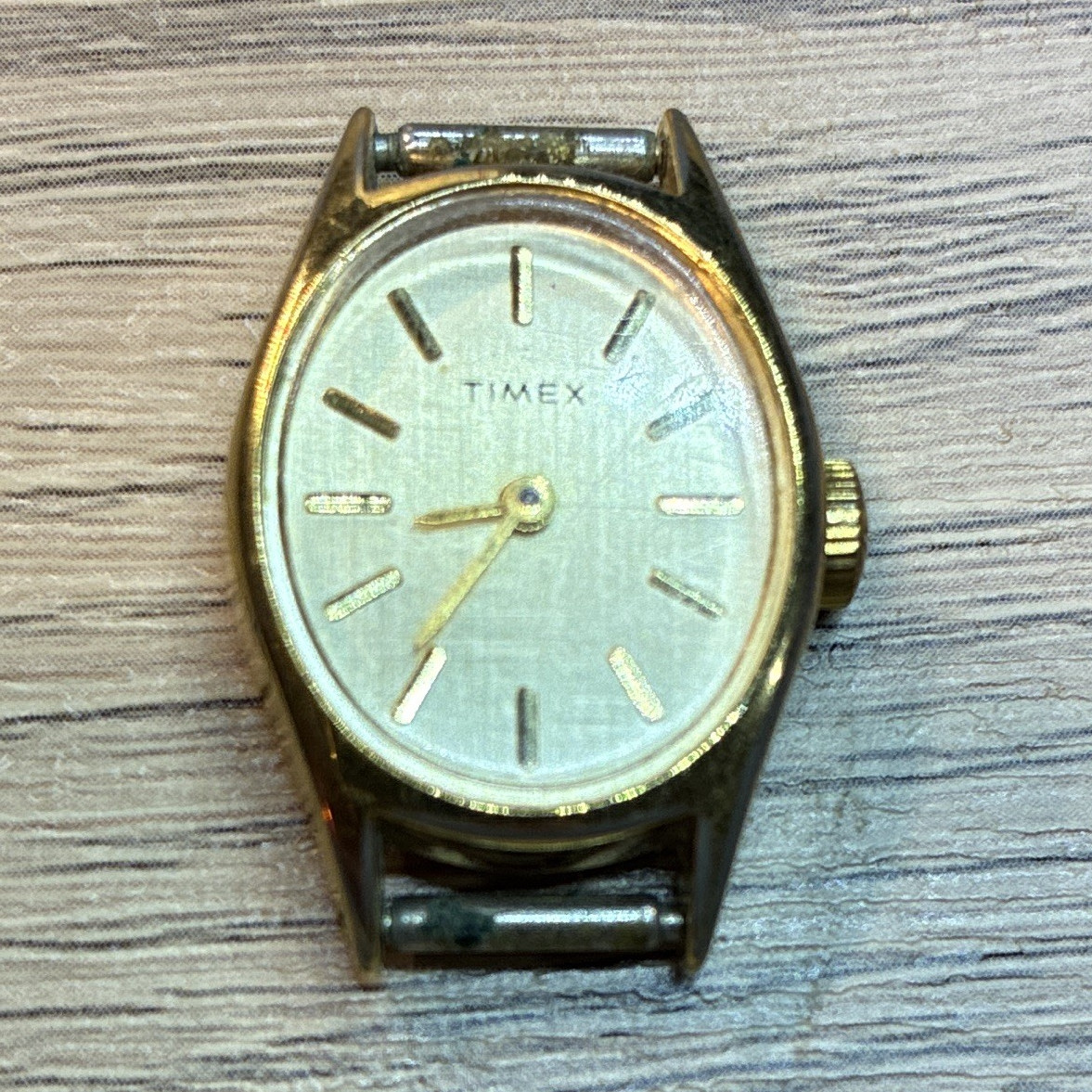 Timex Analog Oval Wristwatch Gold Tone Case & Bezel Silver Dial Stick Indexes
