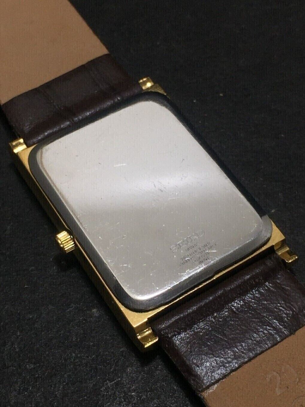 Vintage Seiko Slim Quartz Rectangle White Face Japanese 26MM Case Mens Watch A27