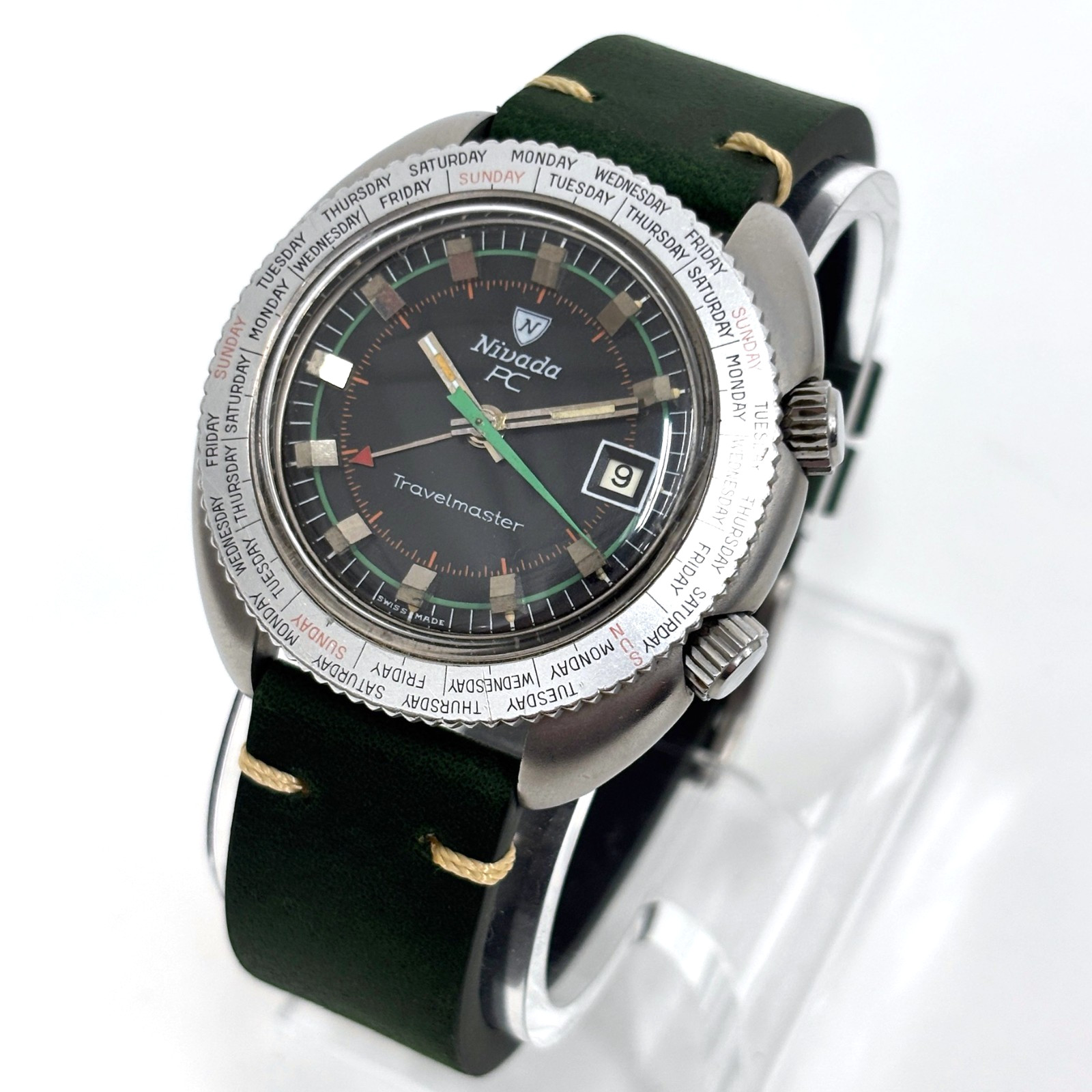 Vintage Nivada Grenchen PC Travelmaster Alarm Date Swiss Made AS 1568 Black Dial