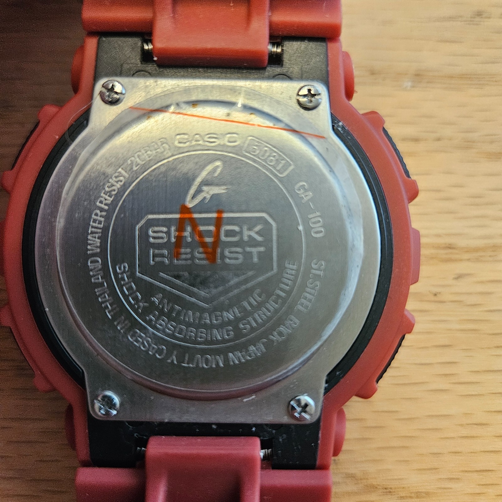 Casio G-Shock Men’s Analog-Digital Watch Red Band with White and Red GA-100B-4A