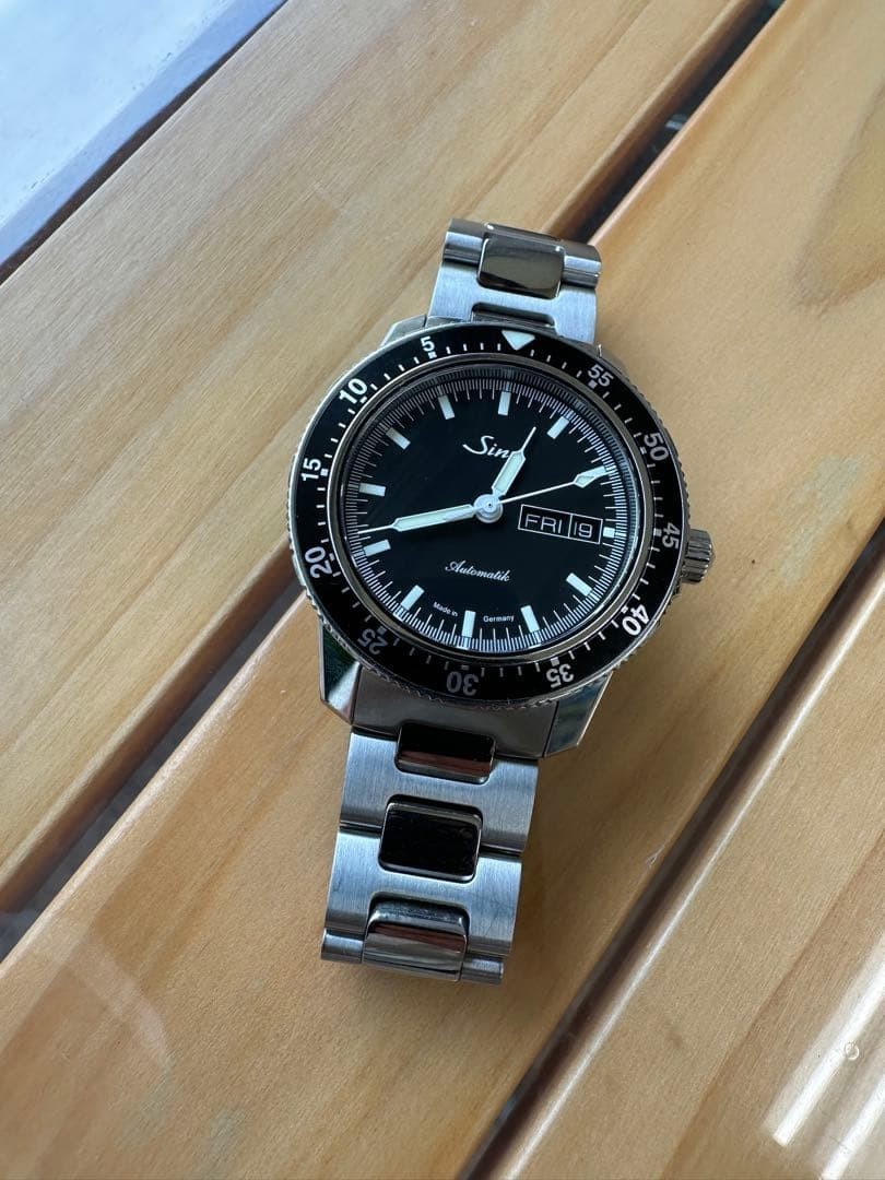 Sinn 104.ST.SA, black dial; includes box and papers, as well as spare links for