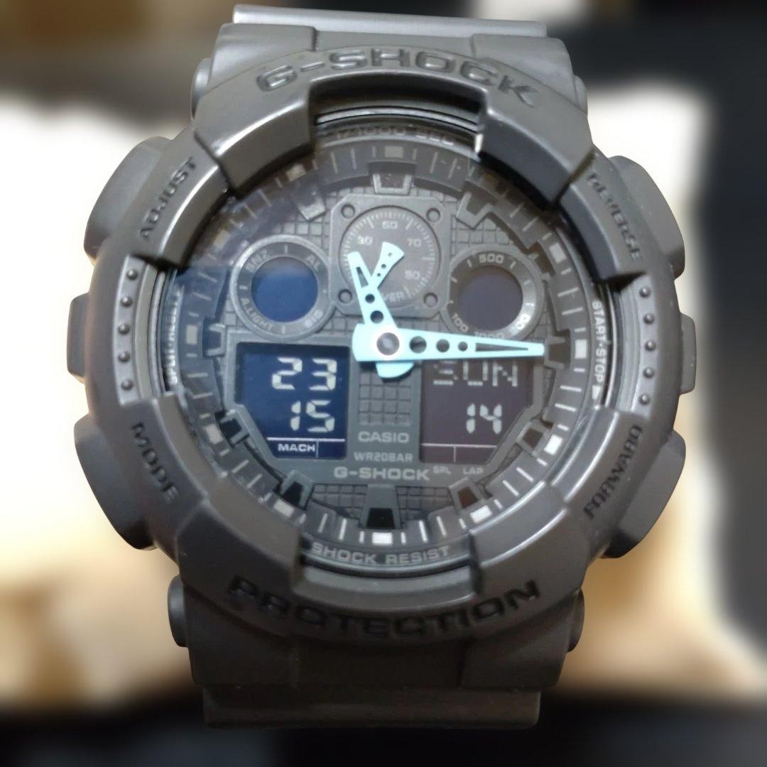 G-SHOCK GA-100C Ana-Digi Watch Gray with Light Blue Hands 20ATM G618