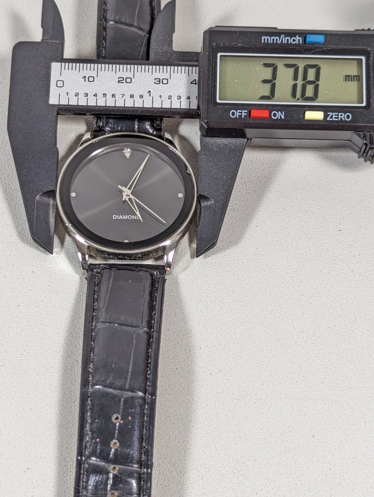 Black Dial Round Silver Tone Case Black Faux Leather Band Watch