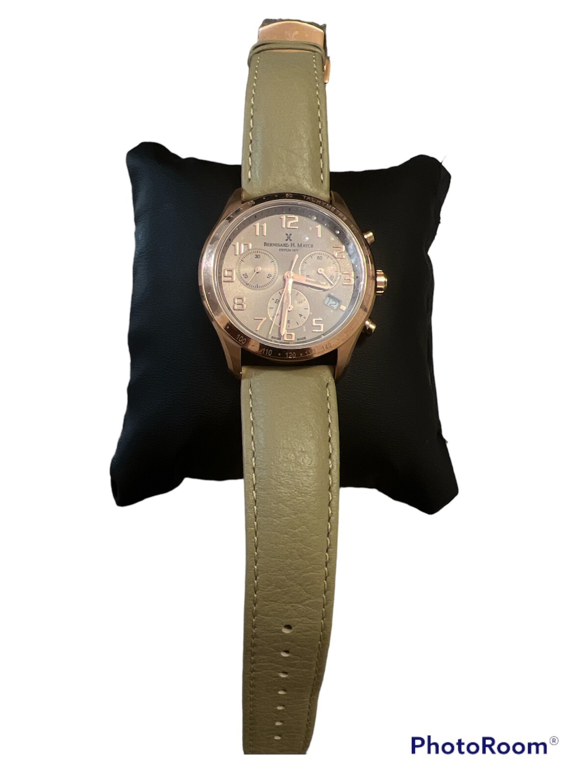 BernHard H. Mayer Womens watch champagne leather strap and stainlees steel.