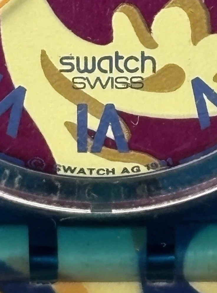 Swatch GN119 Perroquet 34mm Blue Quartz Watch w/Multicolor Band & New Battery