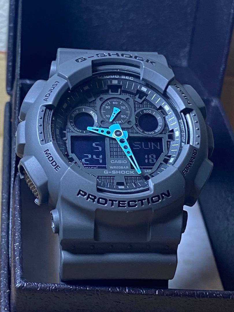 G‐SHOCK GA‐100C Gray ×Light blue/Battery ・ Near