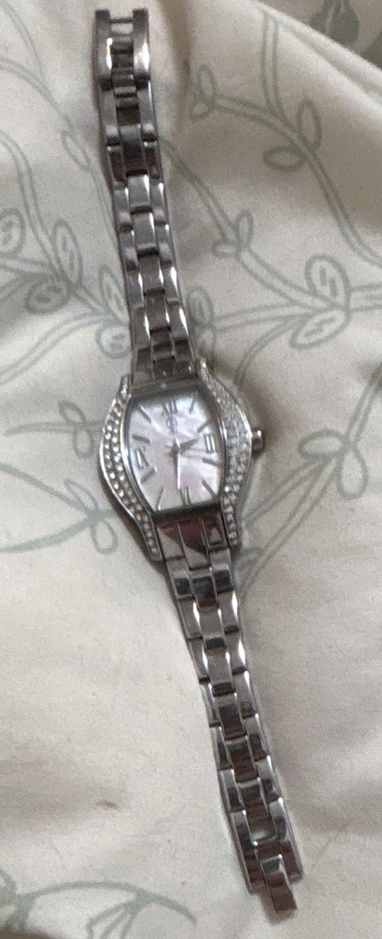 Jennifer Lopez Women’s Quartz Stainless Steel Silver Tone Watch MOP Roman Dial