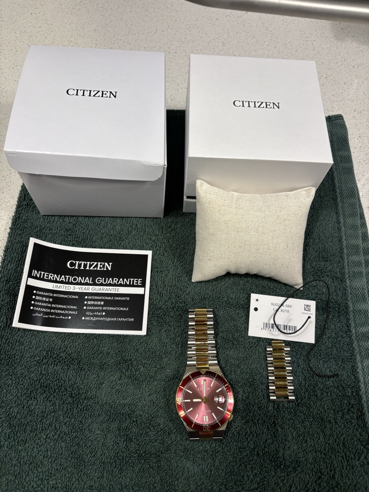 Citizen NJ0234-58X Tsuyosa Automatic Red Dial Gold Tone Stainless Steel Watch