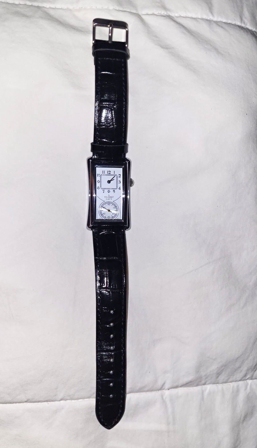 Peugeot Quartz Rectangle Dress Watch White Dial Silver Steel Case Leather.