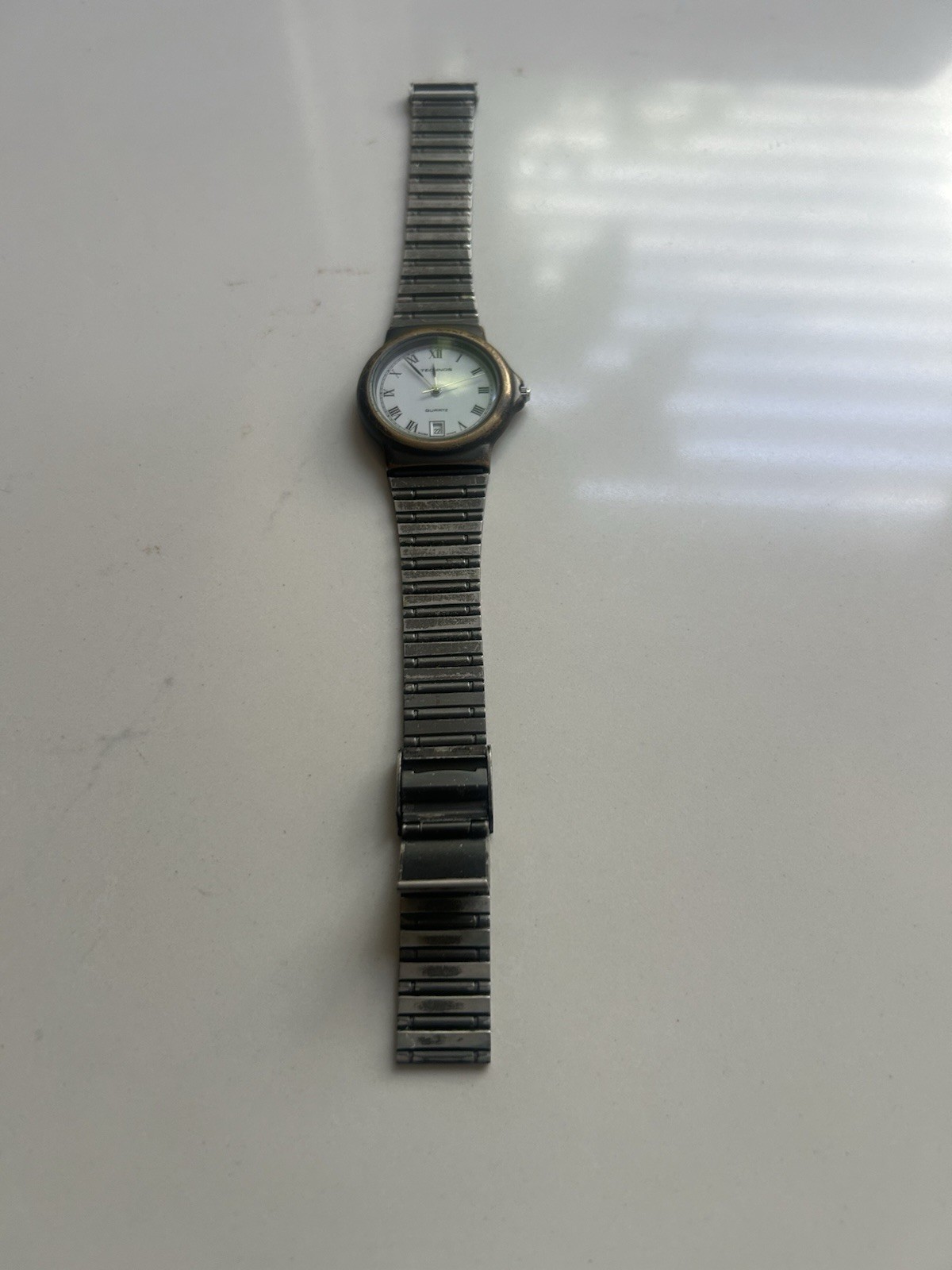 VINTAGE MEN’S TECHNOS ROMAN NUMERALS DATE ATM STAINLESS STEEL WRIST WATCH