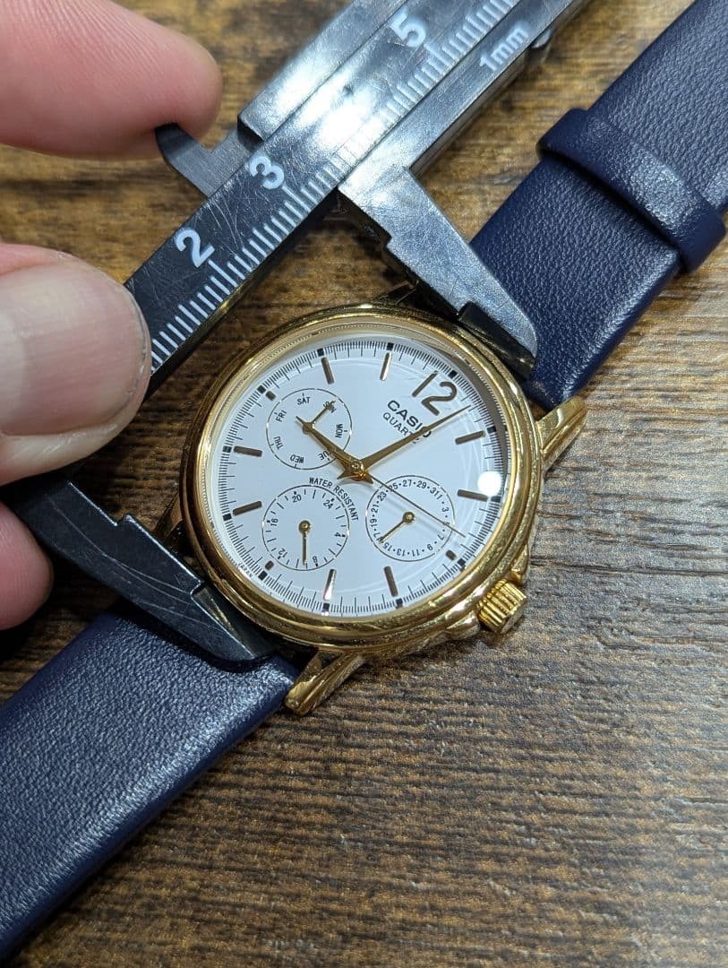 Battery replaced. CASIO Collection MTP-1174 wristwatch, gold.