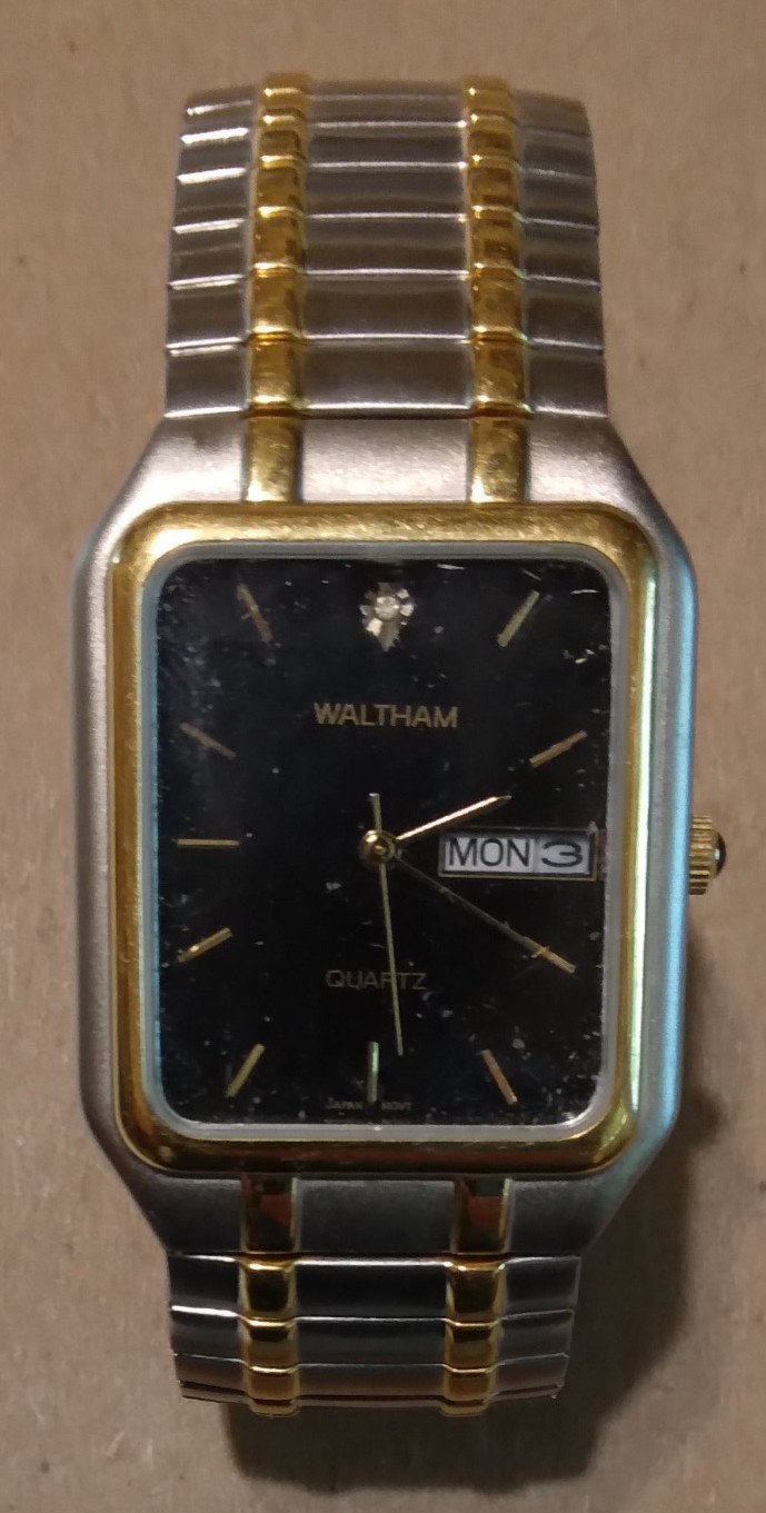 Waltham watch–diamond?–quartz–WME13–day and date–098–PC33–SR626SW