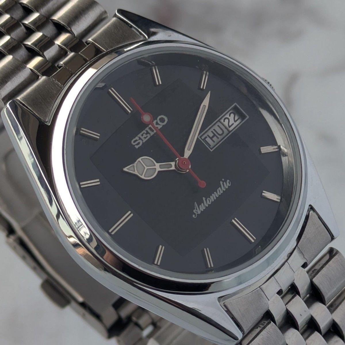 Working SEIKO Automatic 80s Vintage Black Dial Bar Index Ripple 3 Hands Skeleton