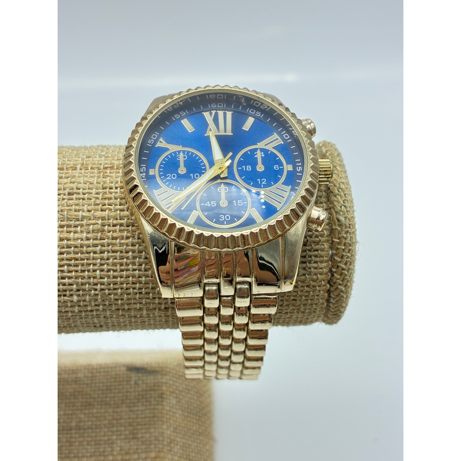Accutime Watch Corp Gold Tone Blue Dial Chronograph Style Watch WM043115 PC21J
