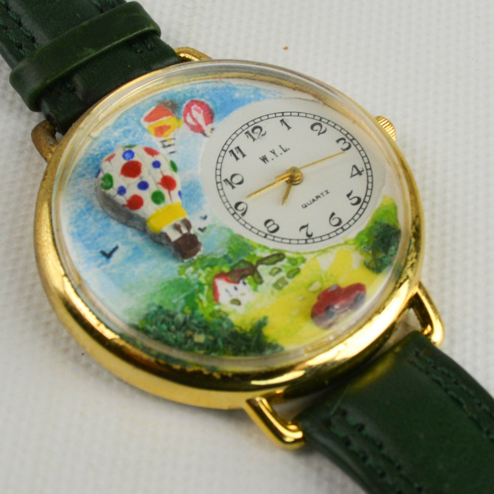 WYL Art Watch Hot Air Balloon with Car & House Green Strap Gold Case