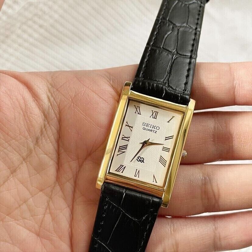 Vintage Seiko Slim Quartz Rectangle White Face Japanese 26MM Case Mens Watch A27