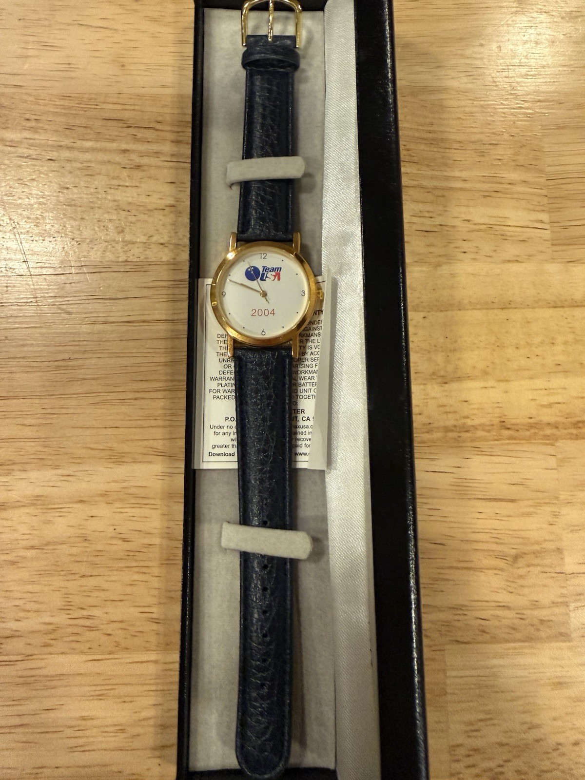 Team USA 2004 Quartz Analog Watch Gold-Tone Case Blue Leather Strap w/ Box