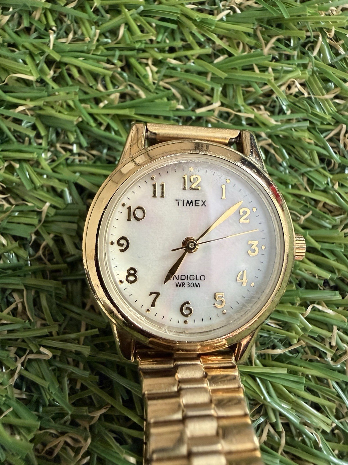 Timex Indiglo Women’s Quartz Analog Gold-Tone Stretch Band White Dial 30m
