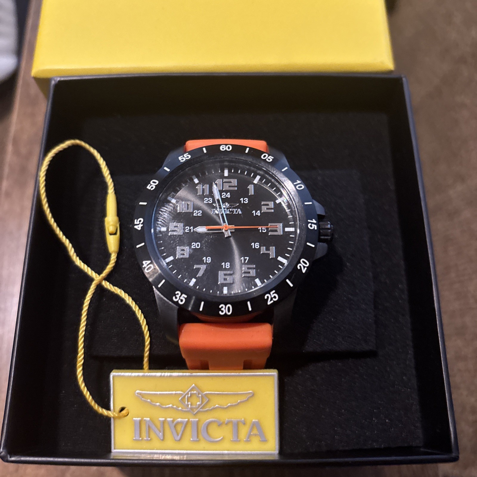 Invicta Men’s Analog Wristwatch Black Dial Orange Band