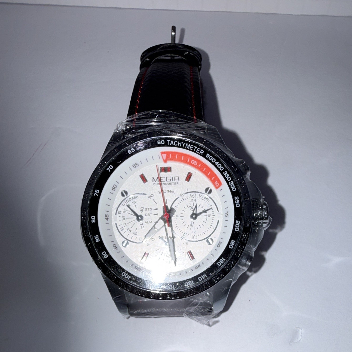MEGIR Men’s Quartz Analog Wristwatch Tachymeter White/Red Dial Black/Red Leather