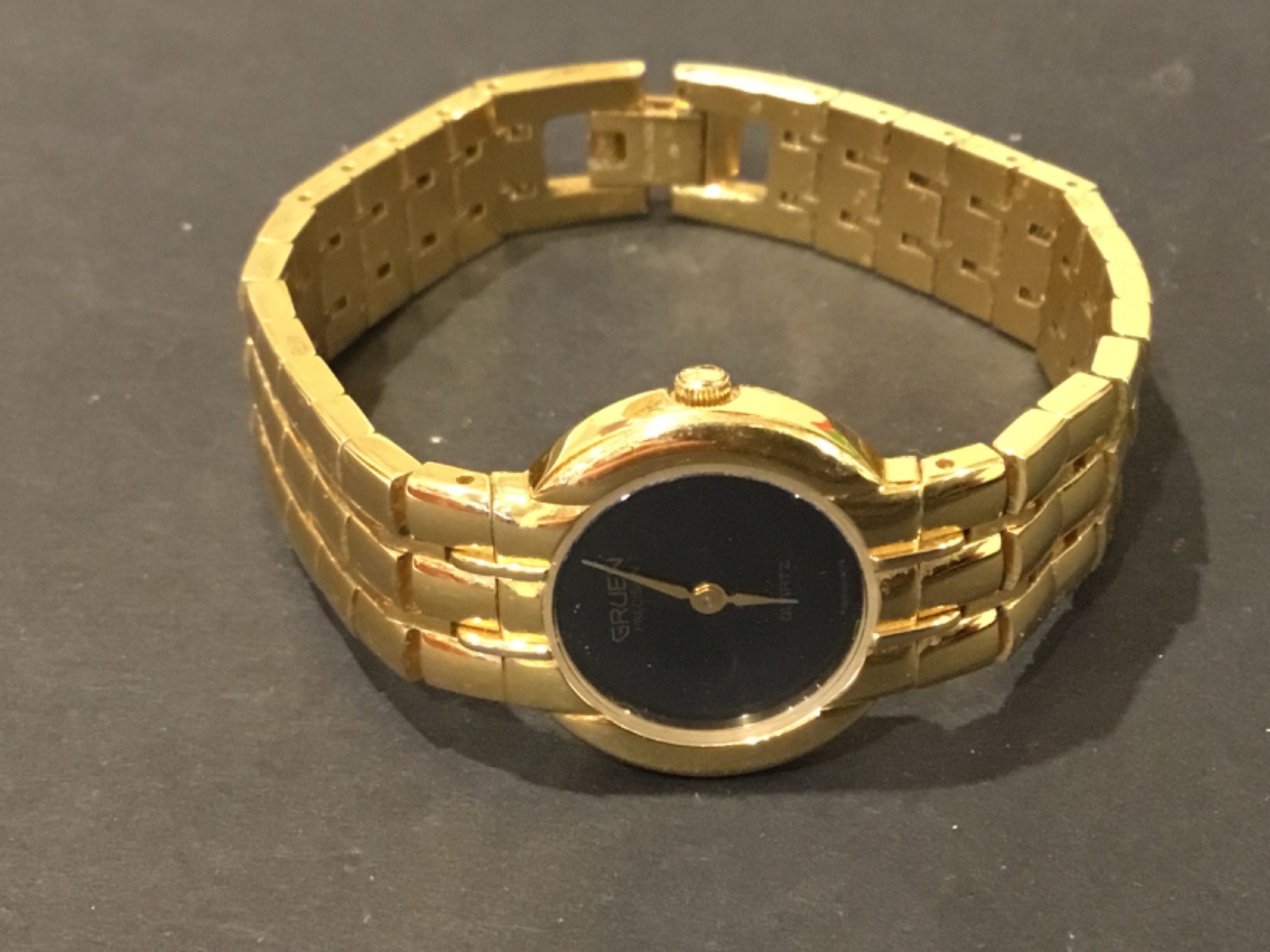 Vintage Ladies Gruen Gold Tone Plain Black Face Watch