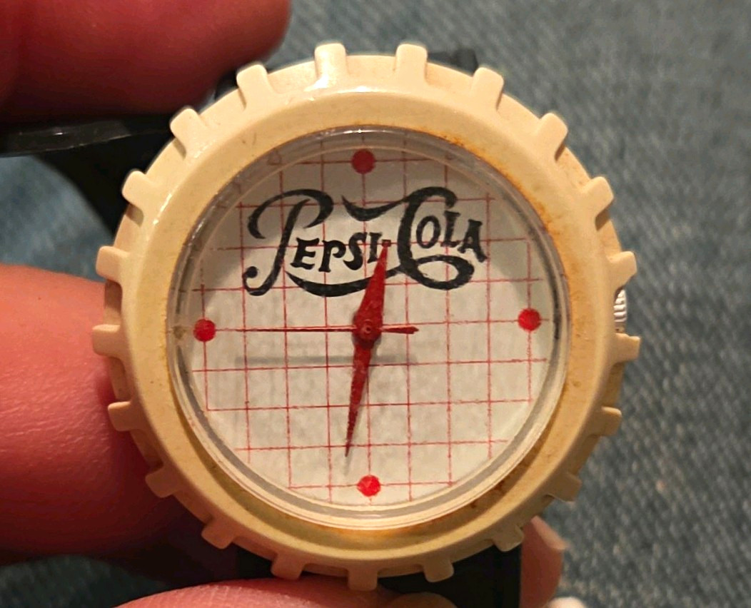 Pepsi-Cola Quartz Analog Wristwatch 34mm Beige Plastic Case Black Rubber