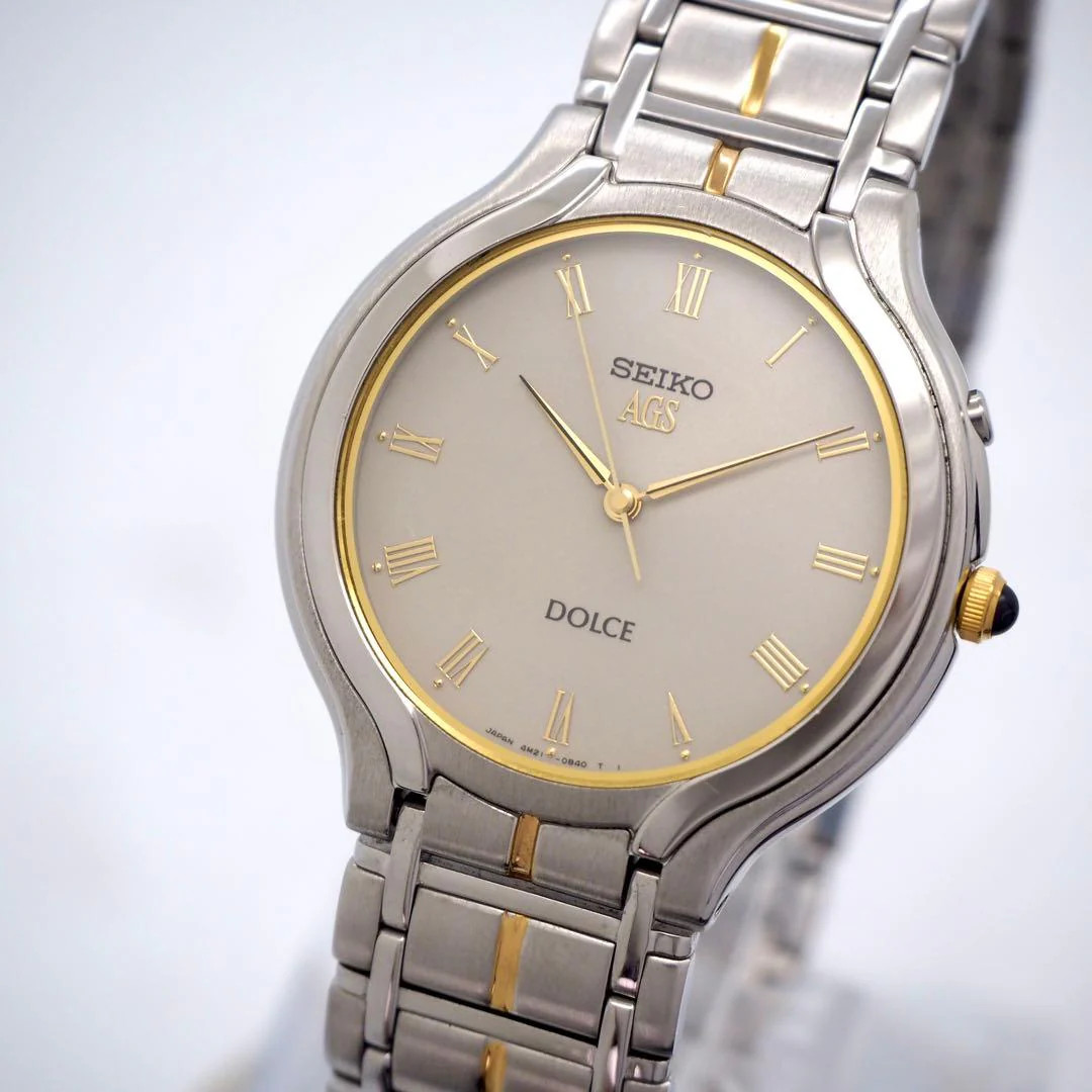 SEIKO Dolce AGS 4M21-0B20 Kinetic 34mm Silver Dial Silver Gold Band