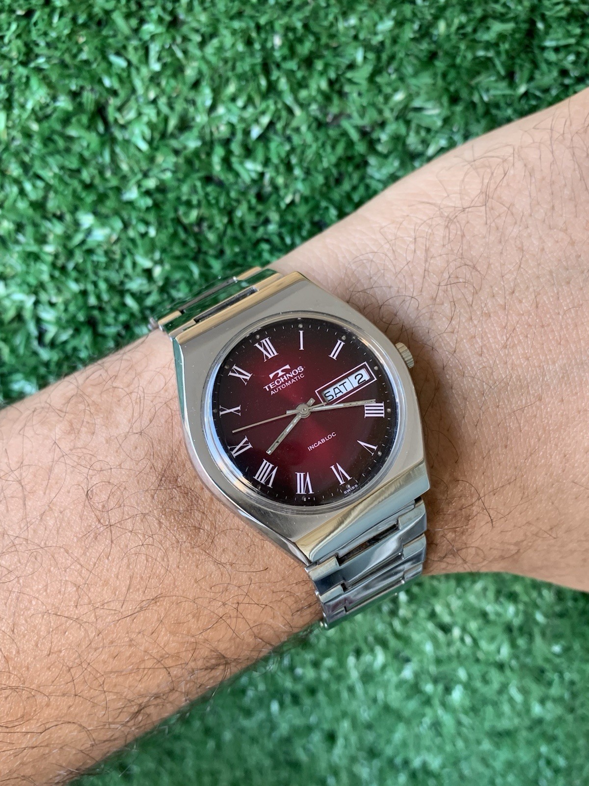 Technos Men’s Automatic Red Dial Stainless Steel Watch 1970s Vintage Swiss Made