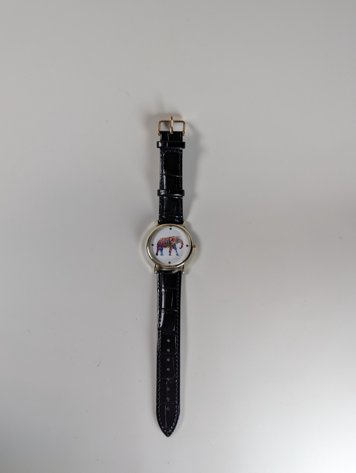 Elephant watch with flower pattern and dot indexes black leather band