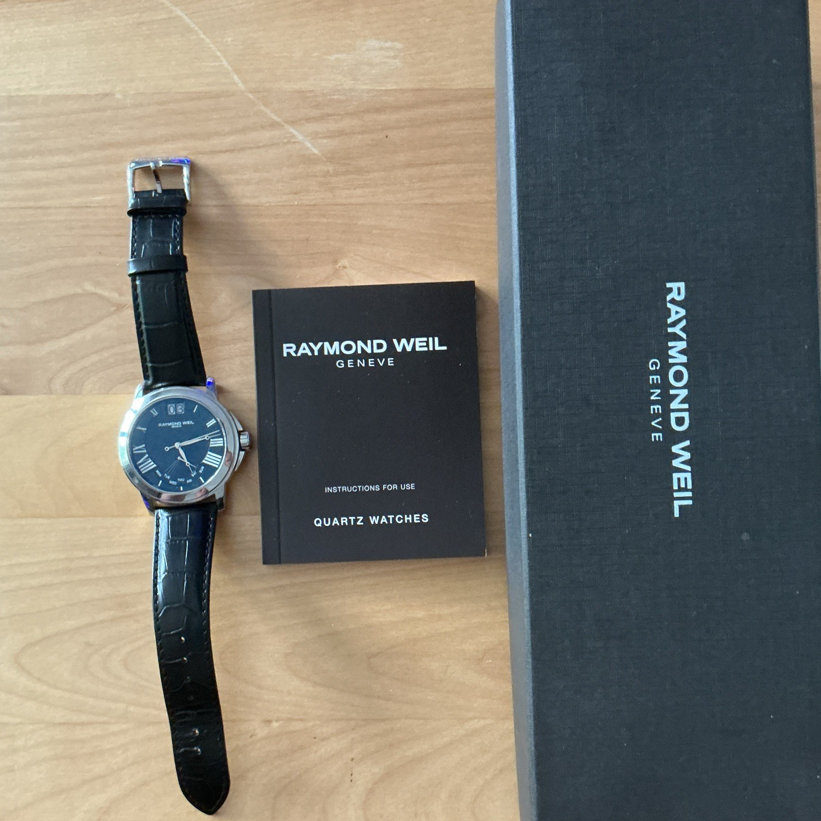 RAYMOND WEIL Geneve Quartz Black Dial Roman Numerals Day/Date Leather Box