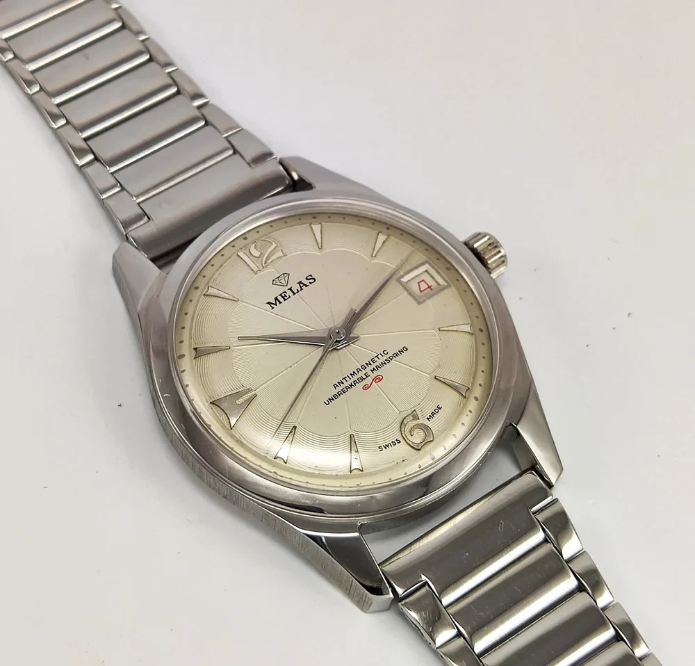 Working Melas Pearl Dial Date Function Handwinding Transparent Back Wrist Watch