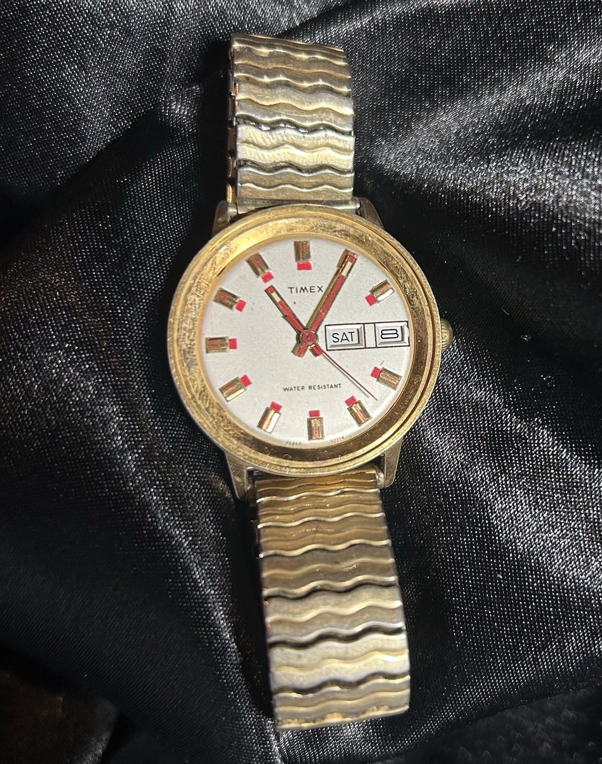 Timex Men’s Quartz Day/Date Water-Resistant Gold-Tone Case Silver Band