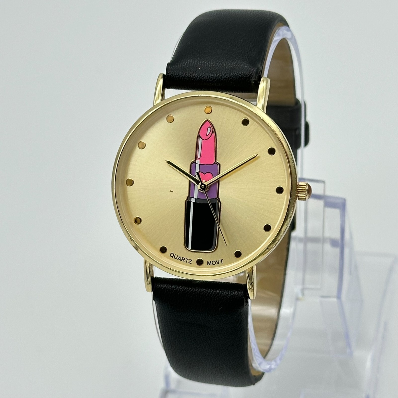 Unworn Ladies C Gold Tone, Pink Lipstick Dial Quartz Watch, Black Band, 36mm